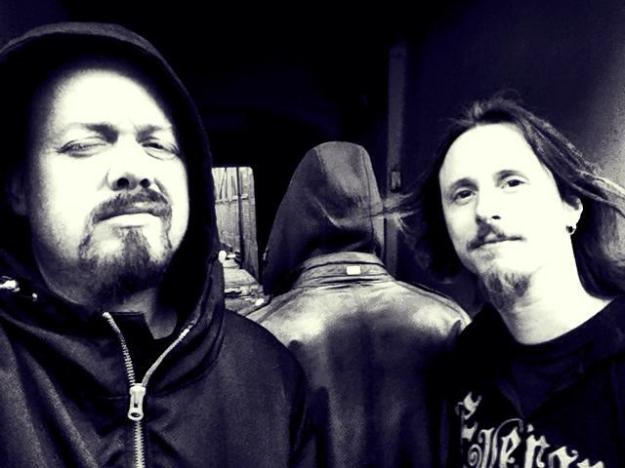 Tom, Rikard and a mysterious new member of Evergrey. Just who is the new drummer?